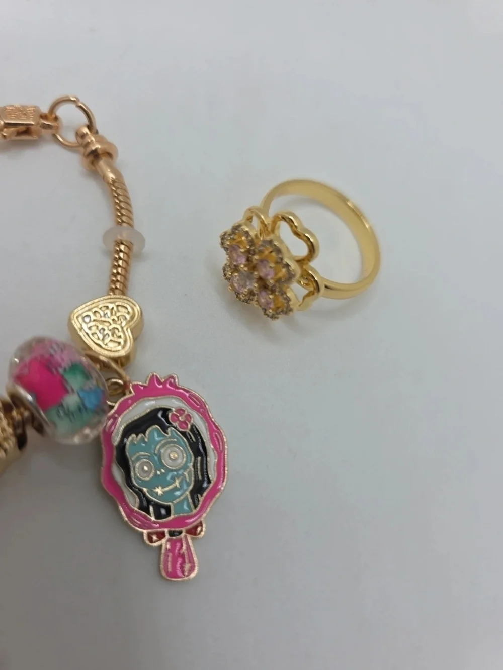 Monster High Pink & Gold Charm Bracelet with Dress, Bow, Skull & Mirror Charms